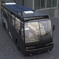 Black Motorhome With Solar Panels On Roof Blue Accents And Beige Seats Interior