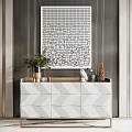 Modern Entryway Console Cabinet With Geometric Doors Potted Plant And Abstract Wall Art