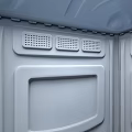 Portable Gray Public Toilet With Secure Door And Ventilation Features