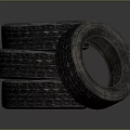 Decorative Ornament Set with Three Stacked Tires and One Tilted Tire