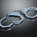 Detailed View Of Shiny Metal Handcuffs With Linked Chain And Classic Design