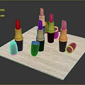 Colorful Lipsticks With Black Cases And Gold Bases Open Closed On Wooden Tray