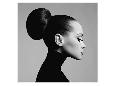 Profile View Portrait of a Woman With Sleek High Bun Hairstyle and High Neck Top 3d model