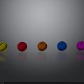 Colorful Basketballs Arranged In Row With Gray Background And Reflections