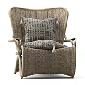 Modern Rattan Leisure Chair with Armrests Circular Pattern Cushion and Tassel Accents