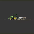 Green Tractor With Large Wheels Attached To Agricultural Cultivation Implement In Field