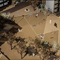 Community Outdoor Playground Area With High Rise Buildings Play Equipment Trees And Paved Ground