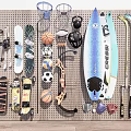 Assorted Sports Equipment Display With Skis Skateboards Basketballs Soccer Balls And Surfboard On Pegboard