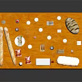 Assorted Food Items On Yellow Table With Bread Milk Eggs And Drinks