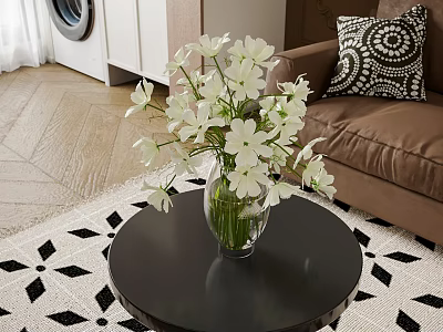 White Flowers in Glass Vase on Black Round Coffee Table with Brown Sofa and Pillow 3d model