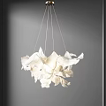 Modern Artistic White Chandelier With Irregular Folded Design Hanging In Room