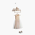 Beige Lace Tulle Dress Hanging on Hanger With Small Wooden Shelf and Toy Accents
