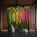 Vibrant Indoor Landscape Design With Colorful Bamboo Hanging Flowers Moss Wall And Decorative Stones