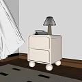 White Bedside Table With Two Drawers Round Legs Lamp Books On Wooden Floor Sunlight Shadows