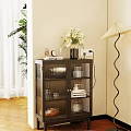 Stylish Glass Door Decorative Cabinet With Interior Books Candles White Flowers And Table Lamp