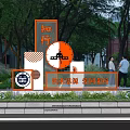 Modern Campus Sculpture Featuring Characters Circular Elements Outdoor Greenery And Background Figures 3d model