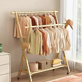 Freestanding Clothes Rack with Hanging Warm Tone Clothing Storage Boxes and Pillow for Home Organization