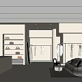 Modern Stylish Clothing Store Interior With Hangers Display Racks Sofa And Bright Lighting
