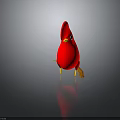 Red Cartoon Bird Figurine With Large Red Head Yellow Beak Red Eyes And Yellow Legs