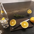 Fresh Whole and Halved Lemons on Wooden Cutting Board with Knife Ice Cubes and Rosemary