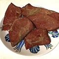 Freshly Cooked Meat Pieces Served On Blue And White Patterned Plate