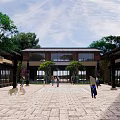 Commercial Landscape Design Featuring Modern Buildings Lush Greenery Water Pond And Stone Paths