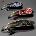 Ceramic Spoon Shaped Vessels Holding Fresh Blueberries Pomegranate and Blackberries