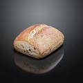 Artisan Whole Grain Bread With Crusty Surface And Grainy Texture On Black Background