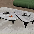 Two Modern Coffee Tables With Marble Tops Dark Legs Featuring Books Cup And Red Fruits