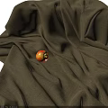 Red Yellow Apple Placed On Brown Textured Fabric With Soft Folds