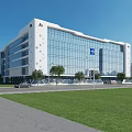 Modern Industrial Plant With Green Roof And Multi Story Structure Surrounded By Greenery