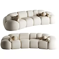 Beige Curved Multi Seater Sofa with Modular Design and Decorative Pillows