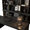 Modern Office Desk Workspace With Dark Wooden Shelves Books Sculptures And Framed