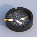 Decorative Ornament Set Including Black Ashtray With Cigarette Butts And Ash