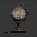 Decorative Ornament Set Featuring Globe With Ornate Base And Maple Leaves Accents