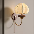 Elegant Wall Lamp With Patterned Shade Wooden Base And Golden Bracket Mounted On Wall