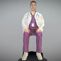 A Male Doctor Sitting In Purple Scrubs With White Coat Stethoscope And ID Badge