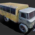 Vintage Green And Yellow Truck With Large Tires And Rustic Exterior Design