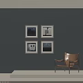 Abstract Paintings On Dark Gray Wall With Four Framed Artworks And Brown Chair