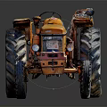 Yellow Vintage Farm Tractor With Large Wheels And Rustic Metal Body