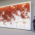 Elegant Window Display With Red Maple Leaves Decoration White Background And Display Stands With Books