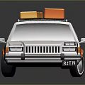 Vintage White and Orange Station Wagon With Orange Storage Boxes on Roof