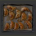 Golden Brown Baked Dumplings Arranged On Parchment Lined Baking Tray