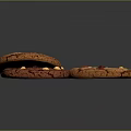 Chocolate Cookies With Nuts Red Dried Fruits And Cracked Surface On Dark Background