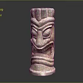 Ancient Stone Totem Sculpture Carving With Detailed Facial Features And Patterns