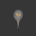 Transparent Glass Bulb Container Holding Two Golden Bells With Bottom Ring Hook On Dark Background