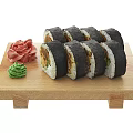 Delicious Sushi Rolls Served on Wooden Board with Chopsticks Soy Sauce Wasabi and Pickled Ginger