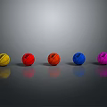 Colorful Basketballs Arranged In Row With Gray Background And Reflections