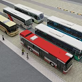 Various Colored Buses Parked in Paved Outdoor Area with Pedestrians