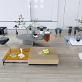 Various Modern Coffee Tables In Living Room With Decorative Plants And Fruits
